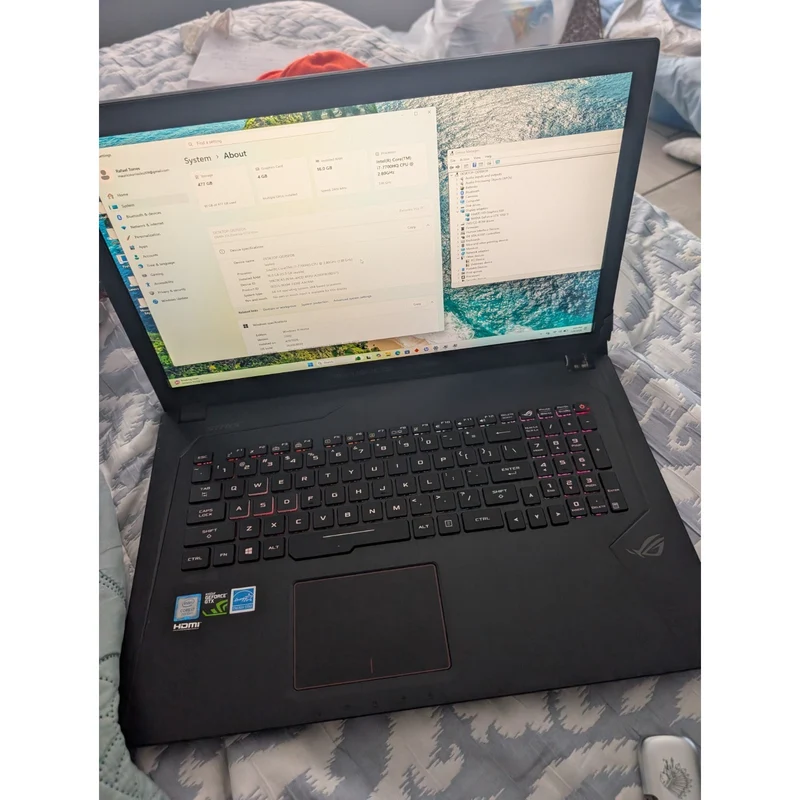 ASUS ROG STRIX GL753VE-DS74 17.3" Full HD Gaming Laptop Intel Core i7-7700HQ @ 2.80GHz Quad-Core Processor (16GB DDR4 + 256GB SSD + 1TB HDD) GeForce GTX 1050 Ti 2GB, Windows 11